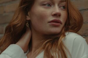 editorial close up portrait of red hair woman in Amsterdam