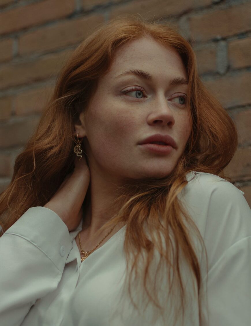 editorial close up portrait of red hair woman in Amsterdam