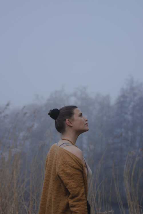 personal branding portrait of woman in Amsterdam park in the morning